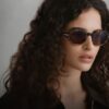 Persol Loris PE 2025 indossati da modella con capelli ricci