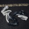Scarpa da corsa adidas Adizero Evo SL Primavera Estate 2025 in versione grigia con dettagli argento